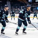 Seattle Kraken Trade Rumors: Why Adding Elite Players is a Struggle Seattle Kraken young stars Shane Wright (51) and Matty Beniers (10) in action at Climate Pledge Arena, highlighting the team’s current offensive talent as they navigate trade rumors and roster improvements.