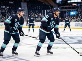 Seattle Kraken Trade Rumors: Why Adding Elite Players is a Struggle Seattle Kraken young stars Shane Wright (51) and Matty Beniers (10) in action at Climate Pledge Arena, highlighting the team’s current offensive talent as they navigate trade rumors and roster improvements.