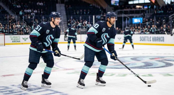 Seattle Kraken young stars Shane Wright (51) and Matty Beniers (10) in action at Climate Pledge Arena, highlighting the team’s current offensive talent as they navigate trade rumors and roster improvements.