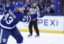 Breakout NHL defenseman Darren Raddysh taking a shot during a game for the Tampa Bay Lightning. Raddysh is a rumored offseason free agency target for the Toronto Maple Leafs retool.