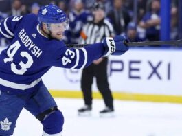 Breakout NHL defenseman Darren Raddysh taking a shot during a game for the Tampa Bay Lightning. Raddysh is a rumored offseason free agency target for the Toronto Maple Leafs retool.