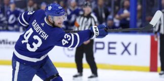 Breakout NHL defenseman Darren Raddysh taking a shot during a game for the Tampa Bay Lightning. Raddysh is a rumored offseason free agency target for the Toronto Maple Leafs retool.