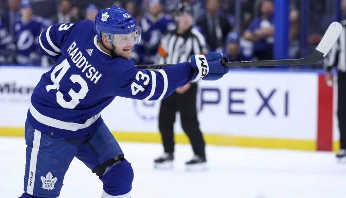 Breakout NHL defenseman Darren Raddysh taking a shot during a game for the Tampa Bay Lightning. Raddysh is a rumored offseason free agency target for the Toronto Maple Leafs retool.