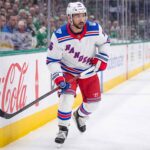 A photograph of New York Rangers forward Vincent Trocheck skating on the ice, fueling trade rumors about his future with the team.