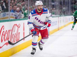 A photograph of New York Rangers forward Vincent Trocheck skating on the ice, fueling trade rumors about his future with the team.