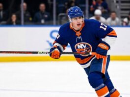 A photorealistic depiction of New Jersey Devils defenseman Šimon Nemec wearing a New York Islanders home uniform, illustrating trade rumors linking the player to the Islanders.