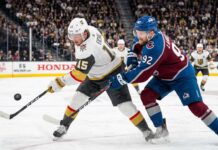How to Watch Colorado Avalanche vs Vegas Golden Knights Game 3 on TV Today Jack Eichel (Vegas Golden Knights, #15) bats a puck out of the air while battling Gabriel Landeskog (Colorado Avalanche, #92) for possession during an intense sequence in the 2026 NHL Western Conference Final.