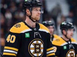 Boston Bruins Trade Rumors: Targeting Canucks’ Elias Pettersson Photo manipulation showing Vancouver Canucks center Elias Pettersson wearing a black Boston Bruins home jersey and helmet, visualizing a potential blockbuster trade scenario.
