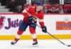 A photo visualization of Ottawa Senators captain Brady Tkachuk wearing a Florida Panthers home jersey and number 7, used in an article discussing NHL trade rumors linking the forward to Florida.