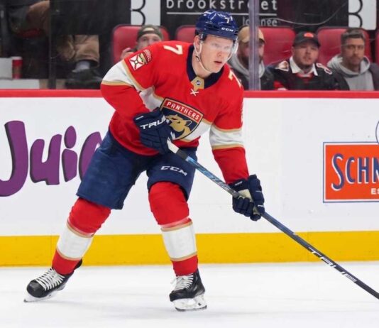 Florida Panthers Trade Rumors: Brady Tkachuk & Ottawa Senators A photo visualization of Ottawa Senators captain Brady Tkachuk wearing a Florida Panthers home jersey and number 7, used in an article discussing NHL trade rumors linking the forward to Florida.
