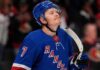 A photo mockup of Ottawa Senators captain Brady Tkachuk wearing a blue New York Rangers number 7 jersey, illustrating the recent NHL blockbuster trade rumors.