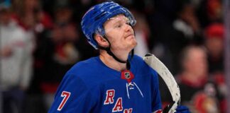 A photo mockup of Ottawa Senators captain Brady Tkachuk wearing a blue New York Rangers number 7 jersey, illustrating the recent NHL blockbuster trade rumors.