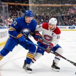 What Channel is the Montreal Canadiens vs Buffalo Sabres Game 7 On? Tage Thompson #72 of the Buffalo Sabres and Nick Suzuki #14 of the Montreal Canadiens intensely battle for the puck on the ice during an NHL playoff game.