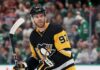 Pittsburgh Penguins Trade Rumors: Will They Acquire Connor McDavid? Edmonton Oilers captain Connor McDavid looking focused on the ice amidst intense Pittsburgh Penguins trade rumors.