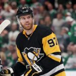 Pittsburgh Penguins Trade Rumors: Will They Acquire Connor McDavid? Edmonton Oilers captain Connor McDavid looking focused on the ice amidst intense Pittsburgh Penguins trade rumors.