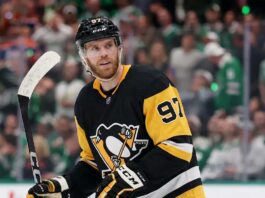 Pittsburgh Penguins Trade Rumors: Will They Acquire Connor McDavid? Edmonton Oilers captain Connor McDavid looking focused on the ice amidst intense Pittsburgh Penguins trade rumors.