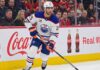 Edmonton Oilers defenseman Darnell Nurse (55) in action during an NHL game, illustrating the player central to the team's current trade and contract discussions.
