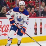 Edmonton Oilers defenseman Darnell Nurse (55) in action during an NHL game, illustrating the player central to the team's current trade and contract discussions.