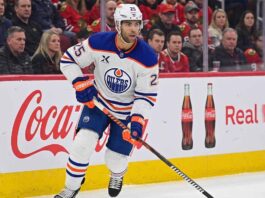 Edmonton Oilers defenseman Darnell Nurse (55) in action during an NHL game, illustrating the player central to the team's current trade and contract discussions.