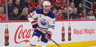 Edmonton Oilers defenseman Darnell Nurse (55) in action during an NHL game, illustrating the player central to the team's current trade and contract discussions.