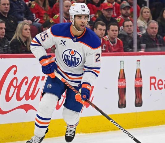 Edmonton Oilers defenseman Darnell Nurse (55) in action during an NHL game, illustrating the player central to the team's current trade and contract discussions.