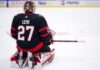 Ottawa Senators Trade Rumors: Devon Levi from Buffalo Sabres A conceptual visualization of goalie Devon Levi wearing an Ottawa Senators black home uniform with number 27, kneeling on the ice amidst NHL trade rumors linking the netminder to Ottawa.