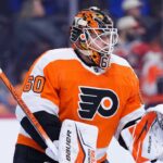 Joseph Woll Trade Rumors: Philadelphia Flyers Target Toronto Maple Leafs Goalie Concept photo of Toronto Maple Leafs goaltender Joseph Woll wearing a Philadelphia Flyers uniform and custom mask, illustrating the proposed trade rumors.