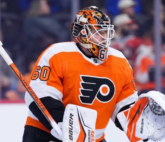 Joseph Woll Trade Rumors: Philadelphia Flyers Target Toronto Maple Leafs Goalie Concept photo of Toronto Maple Leafs goaltender Joseph Woll wearing a Philadelphia Flyers uniform and custom mask, illustrating the proposed trade rumors.