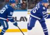 St. Louis Blues players Robert Thomas and Colton Parayko visualized wearing Toronto Maple Leafs home jerseys, illustrating the Darren Dreger trade rumor involving the 1st overall pick.