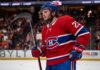 Anaheim Ducks center Mason McTavish on the ice wearing a Montreal Canadiens home jersey, fueling trade rumors about him becoming the Habs' new second-line center.