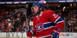 Anaheim Ducks center Mason McTavish on the ice wearing a Montreal Canadiens home jersey, fueling trade rumors about him becoming the Habs' new second-line center.