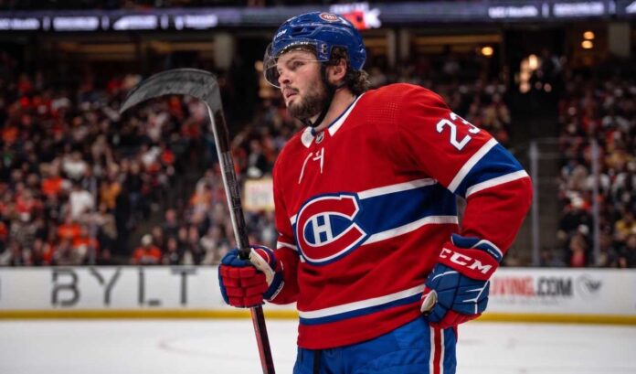 Anaheim Ducks center Mason McTavish on the ice wearing a Montreal Canadiens home jersey, fueling trade rumors about him becoming the Habs' new second-line center.