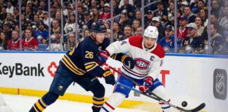 Watch Nick Suzuki and Rasmus Dahlin battle for the puck in the Montreal Canadiens vs. Buffalo Sabres playoff game on May 6, 2026.