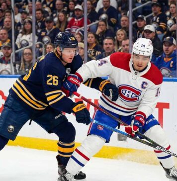 Watch Nick Suzuki and Rasmus Dahlin battle for the puck in the Montreal Canadiens vs. Buffalo Sabres playoff game on May 6, 2026.