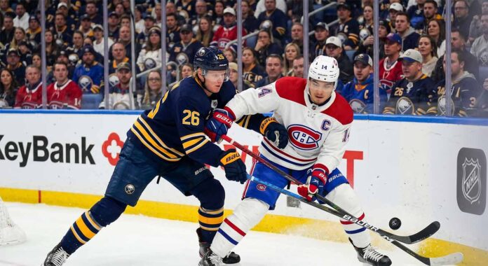 Watch Nick Suzuki and Rasmus Dahlin battle for the puck in the Montreal Canadiens vs. Buffalo Sabres playoff game on May 6, 2026.
