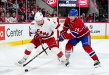 Carolina Hurricanes vs. Montreal Canadiens Game 5 (May 29, 2026): Key Playoff Moments - Nick Suzuki and Taylor Hall Battling for the Puck