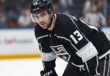 Speculative photo of New Jersey Devils captain Nico Hischier wearing a black Los Angeles Kings home uniform amidst NHL trade rumors.