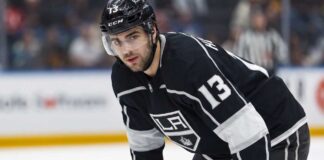 Speculative photo of New Jersey Devils captain Nico Hischier wearing a black Los Angeles Kings home uniform amidst NHL trade rumors.