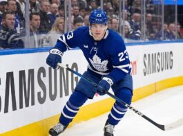 Toronto Maple Leafs forward Matthew Knies, wearing jersey number 23, skating on the ice during an NHL game. This image relates to offseason trade rumors regarding Knies and his perceived high value in the NHL trade market.