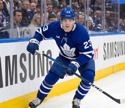 Toronto Maple Leafs forward Matthew Knies, wearing jersey number 23, skating on the ice during an NHL game. This image relates to offseason trade rumors regarding Knies and his perceived high value in the NHL trade market.