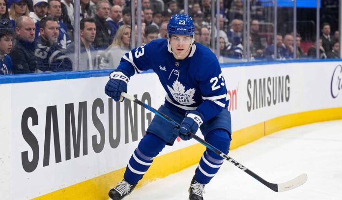 Toronto Maple Leafs forward Matthew Knies, wearing jersey number 23, skating on the ice during an NHL game. This image relates to offseason trade rumors regarding Knies and his perceived high value in the NHL trade market.
