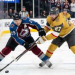 How to Watch Vegas Golden Knights vs Colorado Avalanche Game 2 Tonight An action shot of Nathan MacKinnon (#29) of the Colorado Avalanche battling Shea Theodore (#27) of the Vegas Golden Knights in a crucial playoff game face-off.