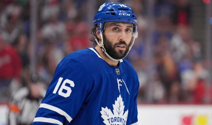 vincent-trocheck-toronto-maple-leafs-trade New York Rangers center Vincent Trocheck, number 16, in action on the ice, subject of intense trade rumors linking him to the Toronto Maple Leafs.