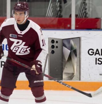 Washington Capitals 2026 NHL Draft: Why Adam Novotny Makes Sense at #18 A photograph of Peterborough Petes forward Adam Novotny (#16) skating with a powerful stance on the ice.