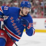 Alexander Nikishin Rangers Trade Rumor: Why the Hurricanes Defenseman Fits New York Alexander Nikishin wearing a New York Rangers home jersey and helmet in trade rumor image after being linked to New York from the Carolina Hurricanes