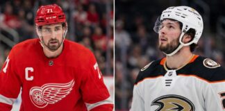 Anaheim Ducks Linked to Detroit Red Wings Captain Dylan Larkin in Blockbuster Rumor Split image featuring Detroit Red Wings captain Dylan Larkin in a red jersey and Anaheim Ducks young center Mason McTavish in a white jersey, illustrating the rumored NHL trade scenario.