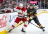 Carolina Hurricanes and Vegas Golden Knights puck battle featuring captains Jordan Staal (#11, 'C') and Jack Eichel (#9, 'A') along the boards during Game 6 of the 2026 Stanley Cup Final.