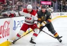 How to Watch Hurricanes vs Golden Knights Game 6: TV Channels & Streaming Carolina Hurricanes and Vegas Golden Knights puck battle featuring captains Jordan Staal (#11, 'C') and Jack Eichel (#9, 'A') along the boards during Game 6 of the 2026 Stanley Cup Final.