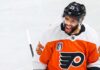 Darnell Nurse Trade Rumors: Edmonton Oilers & Philadelphia Flyers Linked Conceptual photo of Edmonton Oilers defenseman Darnell Nurse wearing a white Philadelphia Flyers jersey amid NHL trade rumors.