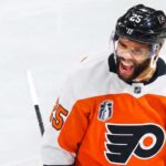 Conceptual photo of Edmonton Oilers defenseman Darnell Nurse wearing a white Philadelphia Flyers jersey amid NHL trade rumors.